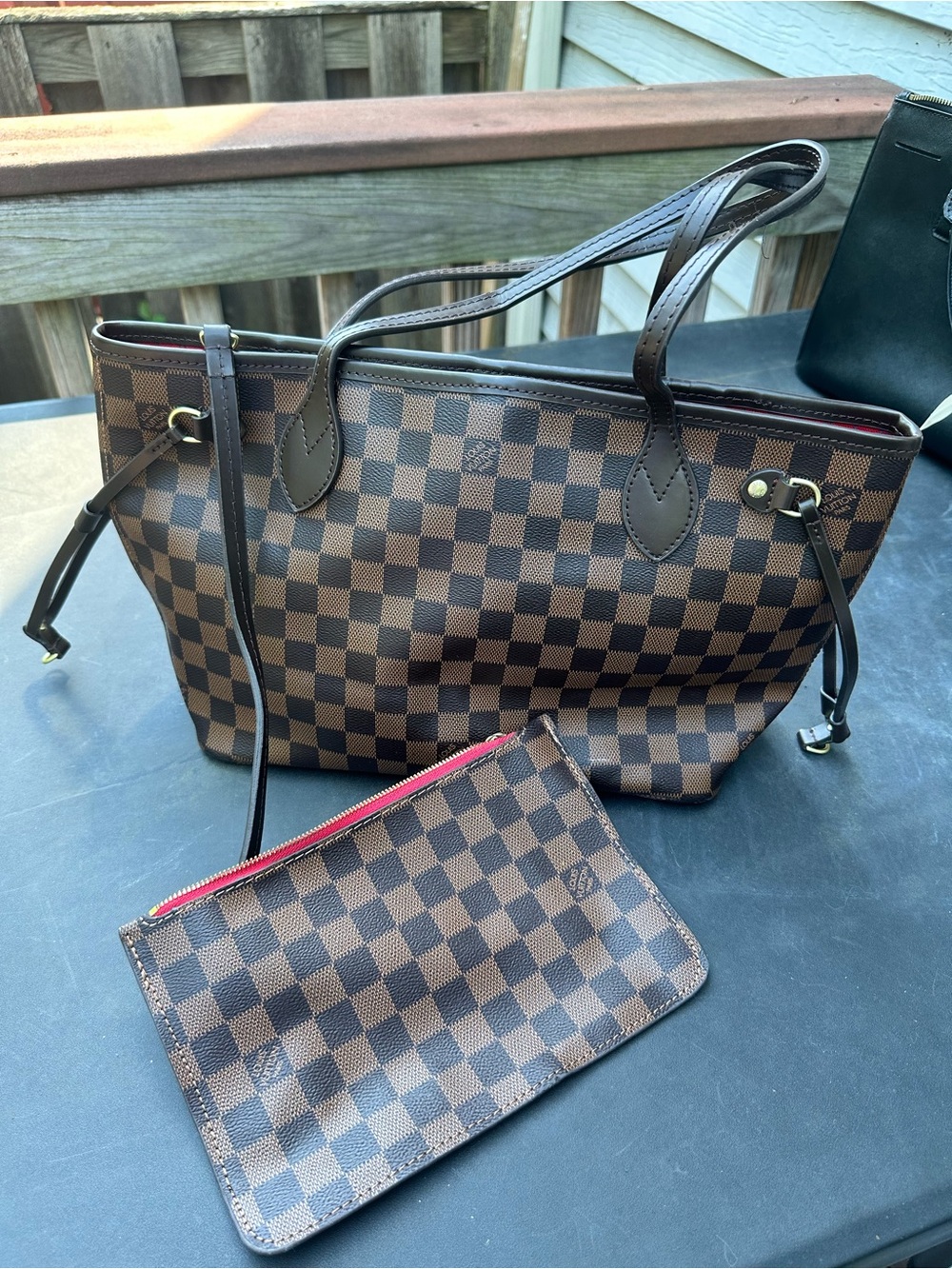 Louis Vuitton wrist bag